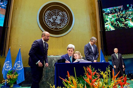 John Kerry, Ban Ki-moon, United Nations, General Assembly hall, April 2016,Paris Agreement,Earth Day 2016, Signing Paris Climate Change Agreement on behalf of the USA with granddaughter on knee